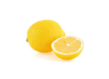 Close-up of orange slice against white background