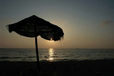 Scenic view of sea at sunset