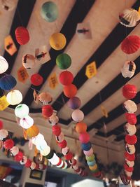 Low angle view of illuminated lanterns hanging