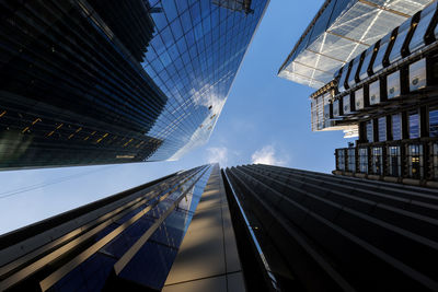 Low angle view of modern buildings against sky
