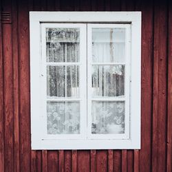 Close-up of closed window of building