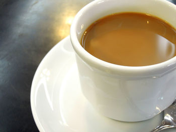 Close-up of coffee served on table