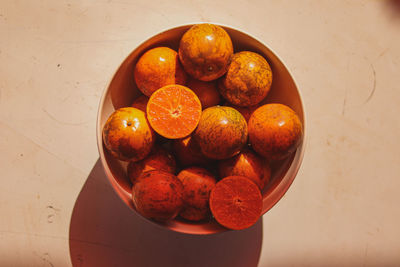 High angle view of fruits in bowl on table