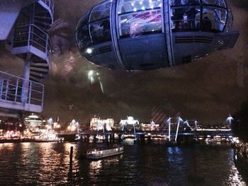 Reflection of city in water at night