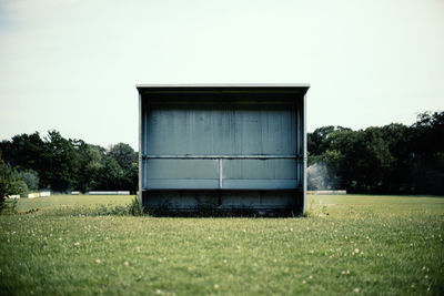 Built structure on field against clear sky