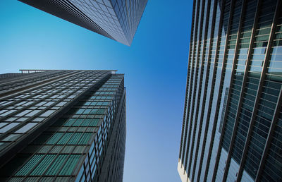 Low angle view of modern buildings against sky