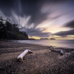 Scenic view of sea against cloudy sky