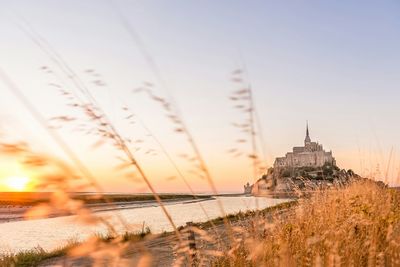 Scenic view of sea at sunset