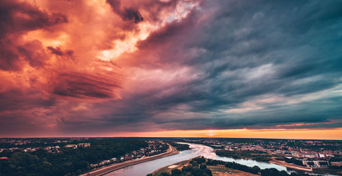 High angle view of road against dramatic sky during sunset