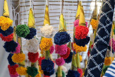 Multi colored flowers for sale at market stall