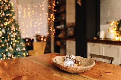 The interior of a christmas decorated kitchen in the loft style in a cozy house