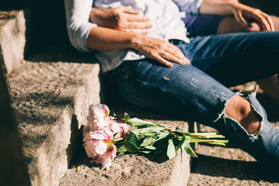 Low section of people sitting outdoors