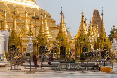 Group of people in temple against building