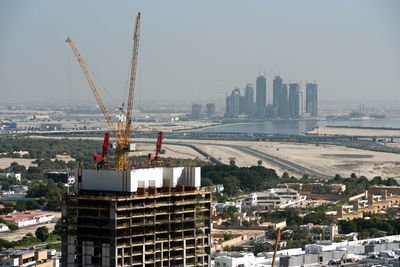 Modern buildings against sky in city