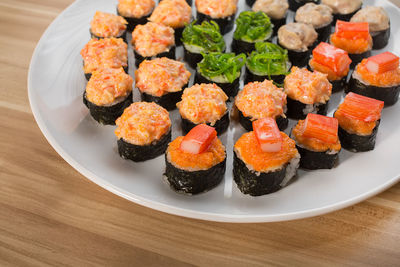 Close-up of sushi in plate on table