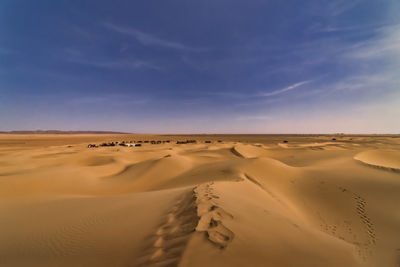 Scenic view of desert against sky