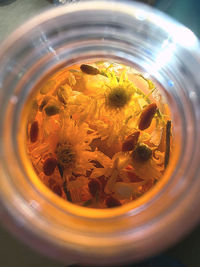 High angle view of glass bowl in jar