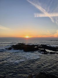 Scenic view of sea against sky during sunset