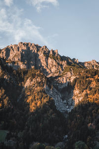 Rock formations on landscape against sky