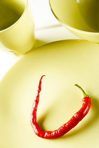 High angle view of chili pepper on table