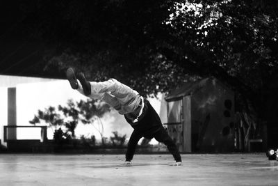 Man skateboarding on tree