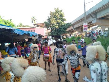 People at town square against sky
