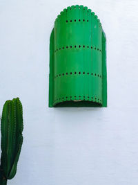 Green simplistic closed window in the old medina of asilah