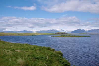 Scenic view of bay against sky