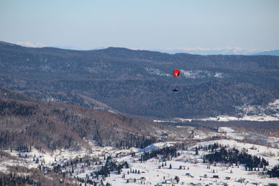Scenic view of landscape and mountains against sky