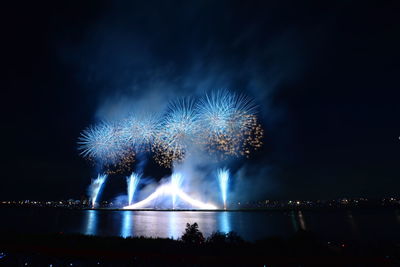 Firework display at night