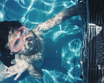 Portrait of man in swimming pool