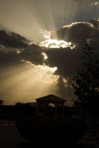 Sun shining through clouds