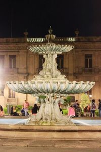 Fountain in front of building