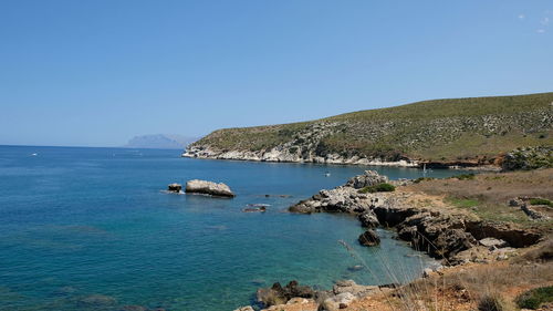 Scenic view of sea against clear sky