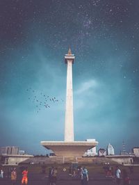 Low angle view of monument at night