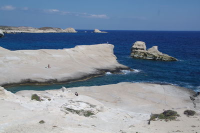 Scenic view of sea against blue sky