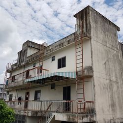 Low angle view of old building against sky