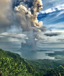 Scenic view of volcanic landscape against sky