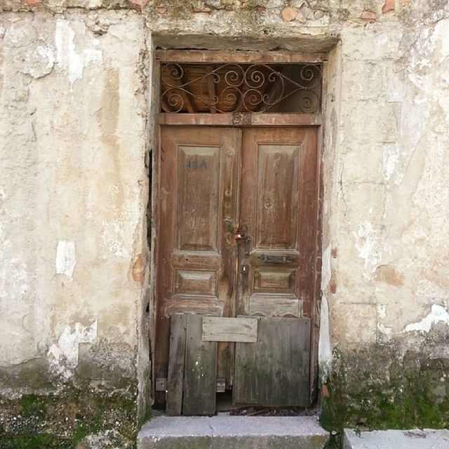 door, architecture, built structure, old, closed, building exterior, weathered, entrance, house, wood - material, doorway, abandoned, window, damaged, run-down, deterioration, wooden, wall - building feature, obsolete, closed door