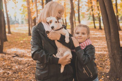 Portrait of woman with dog