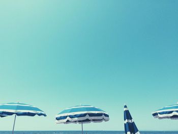 Airplane against clear blue sky