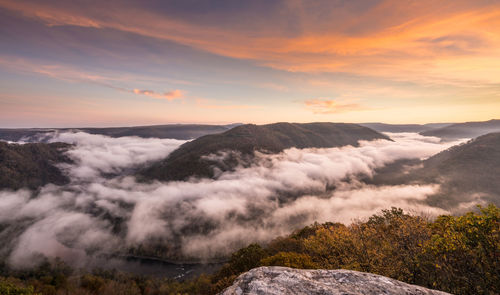 Scenic view of mountains against sky during sunset