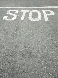 High angle view of text on road
