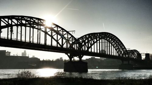 Low angle view of bridge over river