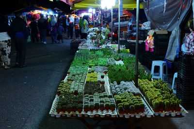 People at market stall