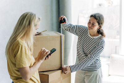 Young woman using mobile phone
