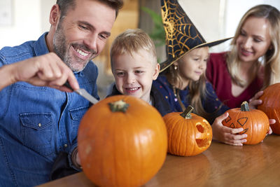 Portrait of smiling boy with children