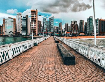 View of modern buildings against sky in city