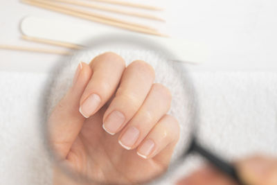 Cropped image of woman holding water