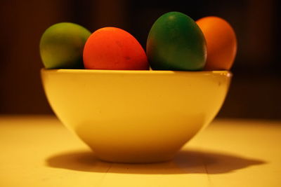 Close-up of fruits in bowl on table